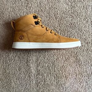Tan Timberland sneaker boots